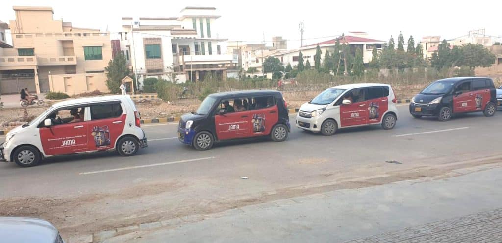 Branded cars with vinyl wrapping advertisement in Karachi for product marketing and outdoor vehicle branding campaign