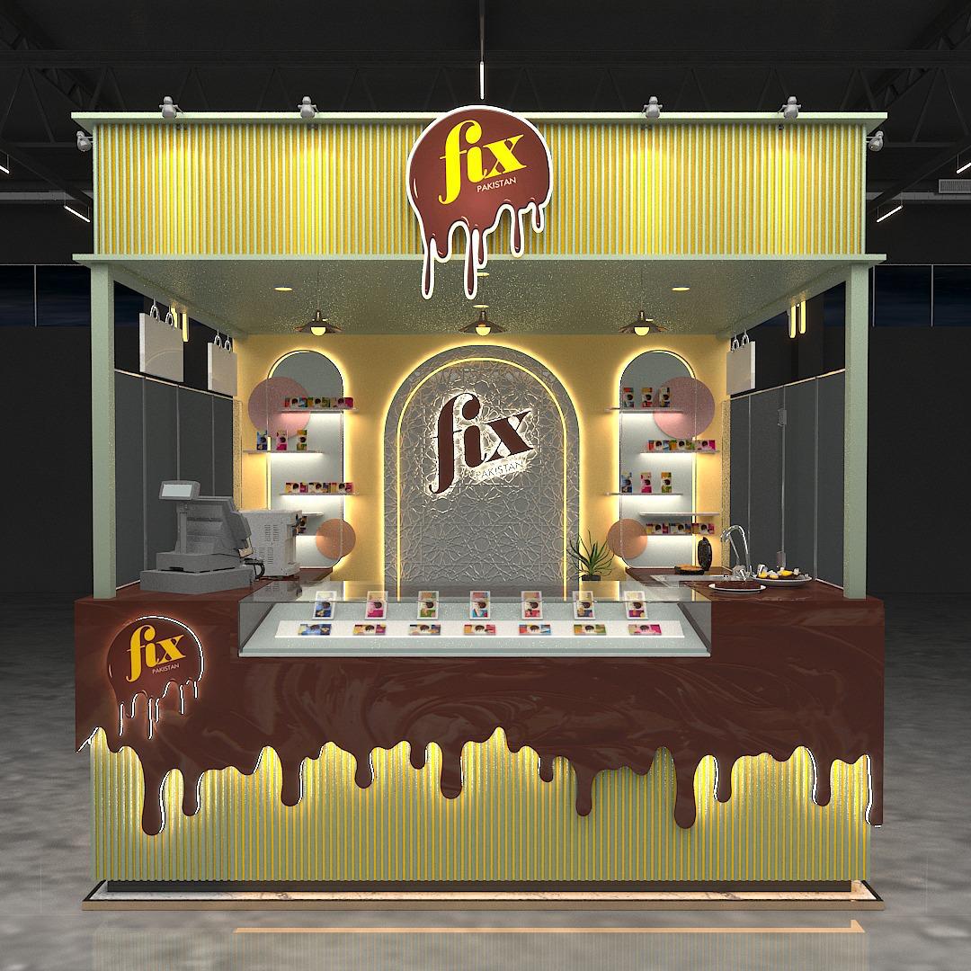 Custom chocolate-themed kiosk fabricated by Artavia Advertising Agency for Fix Pakistan, featuring LED product shelves, acrylic branding, and modern dessert counter design