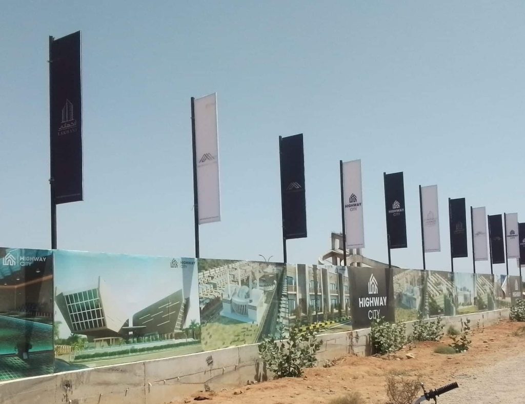 Uniform flag pole banners guiding visitors along event route